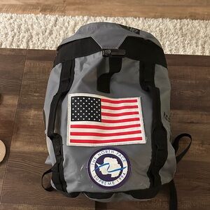 The North Face Gray and Black Backpack with Flag Patch
